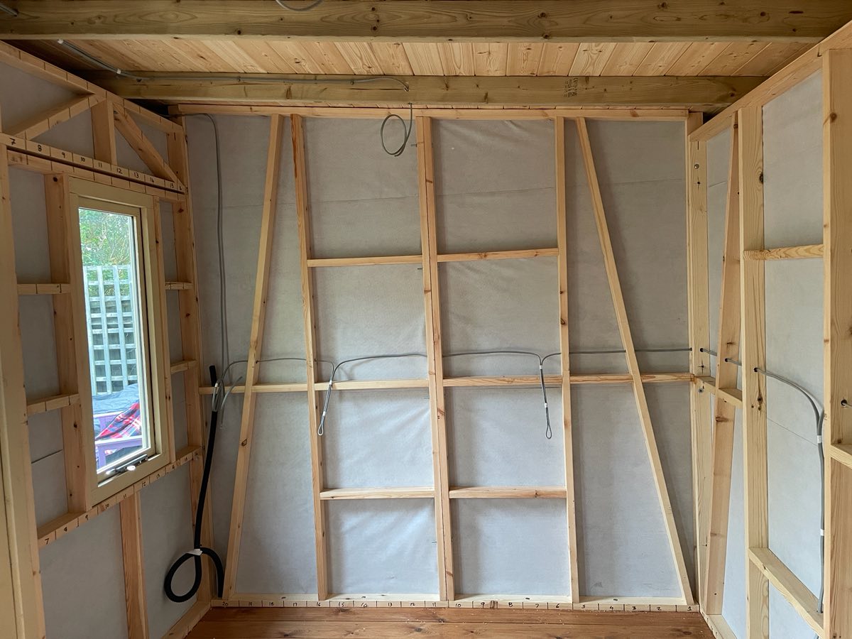 Inside the studio: wall framing and the first cable runs