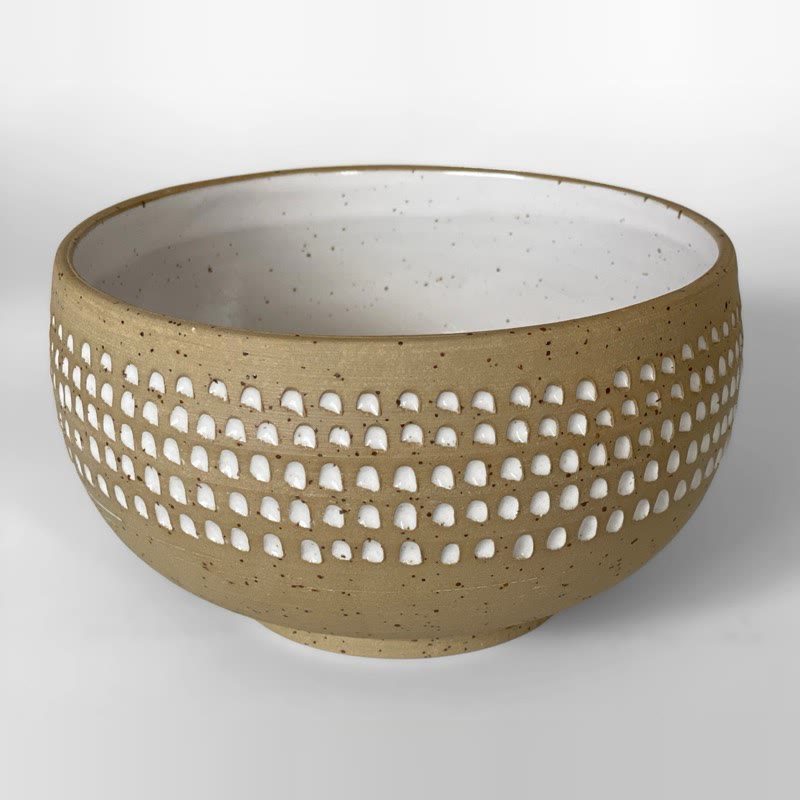 Deep speckled bowl carved with rows of white-glazed dots