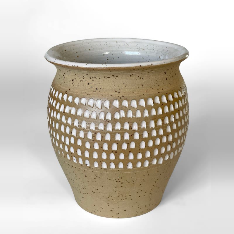 Speckled clay vase with a band of carved white-glazed dots